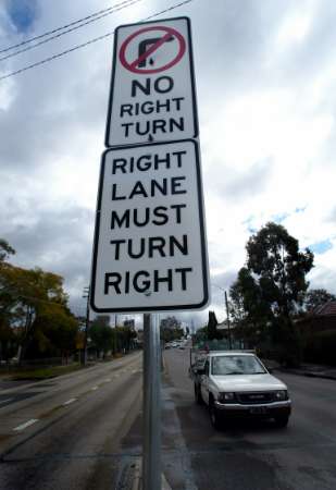 No right turn - right lane must turn right